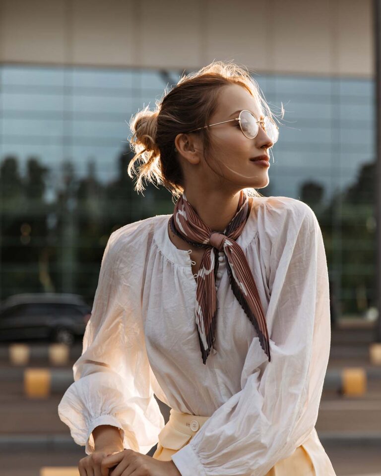 close-up-portrait-of-blonde-woman-in-eyeglasses-b-AFPVDCG